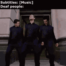 a group of men are dancing in front of a building with the caption subtitles music deaf people