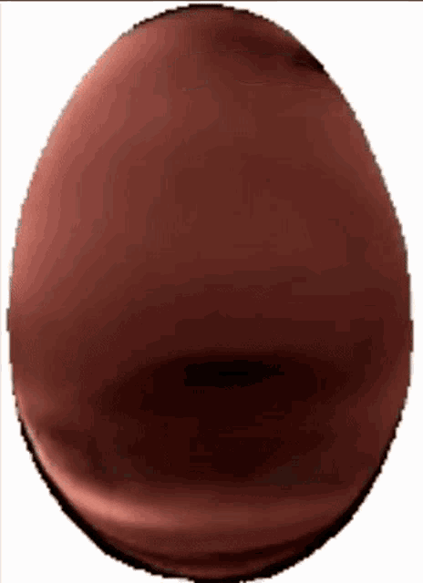a close up of a brown sphere on a white surface