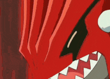 a close up of a cartoon character with a red and white striped shirt and a blue light coming out of his mouth .
