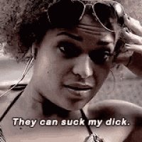 a woman wearing sunglasses is talking on a cell phone and saying `` they can suck my dick . ''