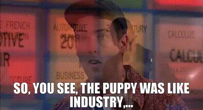 a man in front of a sign that says so you see the puppy was like industry ..