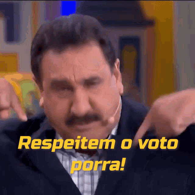 a man with a mustache is pointing at something with the words " respeitem o voto porra " below him