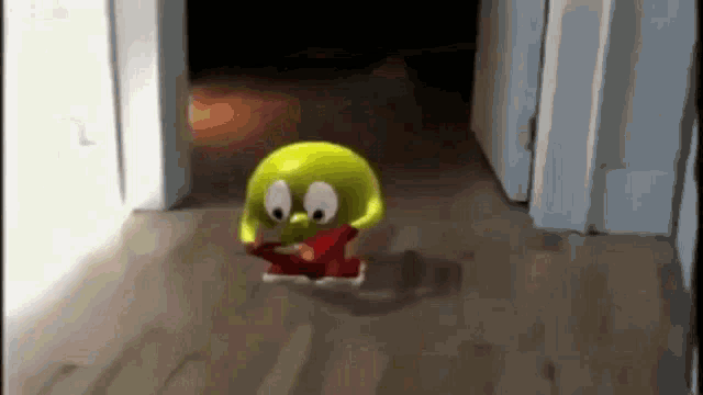 a cartoon character is walking down a hallway with a red shirt on .