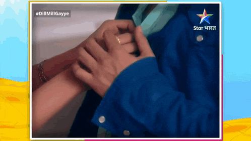 a picture of a man and woman holding hands with a star india logo in the background