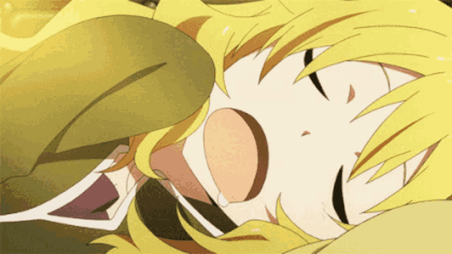 a girl with blonde hair laying down with her mouth open