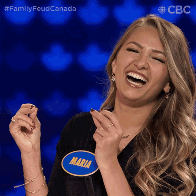 a woman with a name tag that says maria