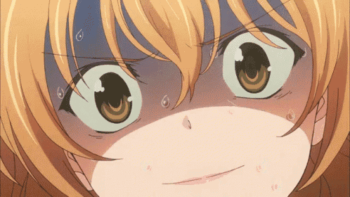 a close up of a girl 's face with tears running down her forehead