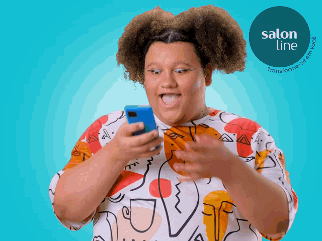 a woman is looking at her cell phone with a salon line logo in the background