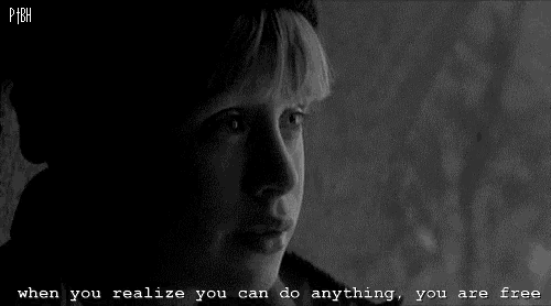 a black and white photo of a person with the words " when you realize you can do anything you are free " below them