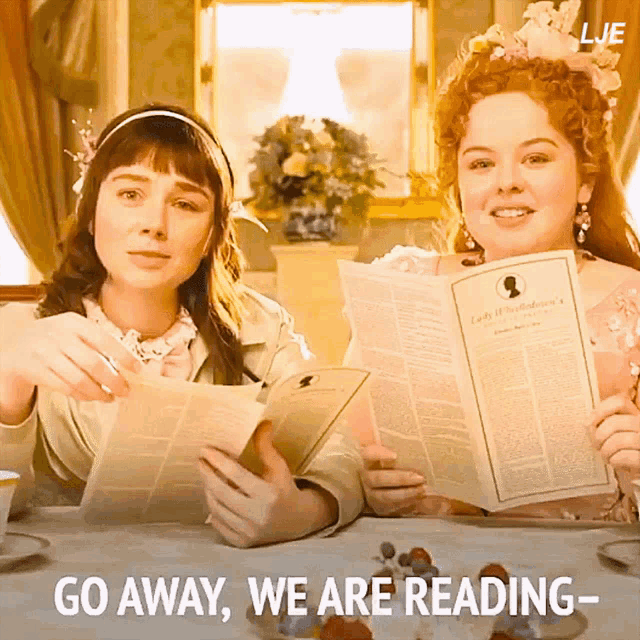 two women sitting at a table reading newspapers with the words go away we are reading below them