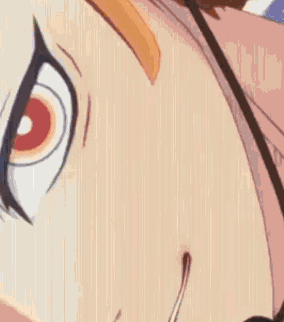 a close up of a cartoon character 's face with a red eye