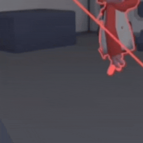 a person is holding a red object in a room with a couch .
