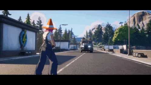 a woman in a cone hat stands on the side of a road
