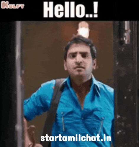 a man in a blue shirt is standing in front of a door with the words hello written above him