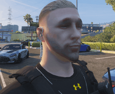 a man wearing a black under armour shirt