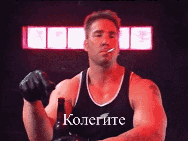 a man smoking a cigarette and holding a bottle of beer with the word kolerite on his chest