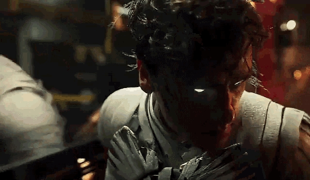 a close up of a man 's face with blood coming out of his nose and mouth .