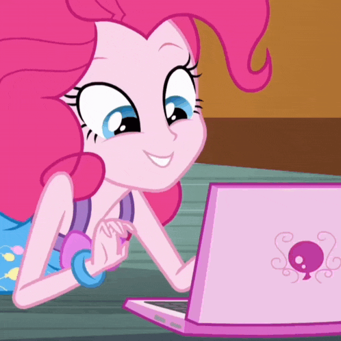 pinkie pie from my little pony equestria girls is smiling while looking at a laptop