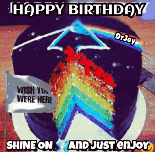 a birthday cake with a slice taken out of it and a flag that says wish you were here
