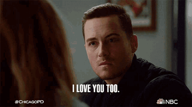 a man in a black jacket says i love you too in front of a woman