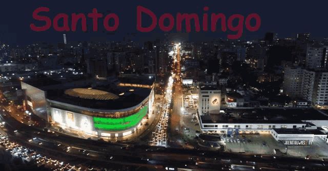 an aerial view of a city at night with the words santo domingo in red
