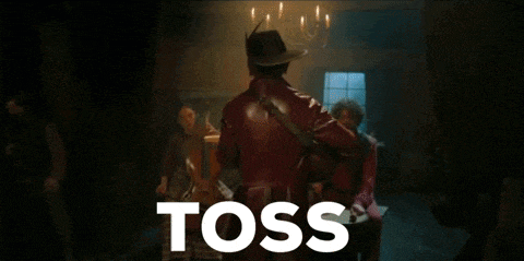 a man in a cowboy hat is dancing in front of a sign that says " the sauceee "