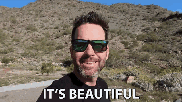 a man wearing sunglasses says " it 's beautiful "