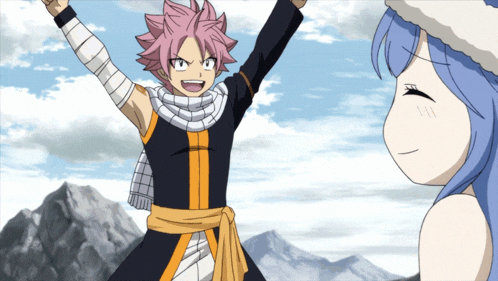 a boy with pink hair is standing next to a girl