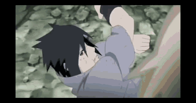 a cartoon character is laying on the ground with his head down .