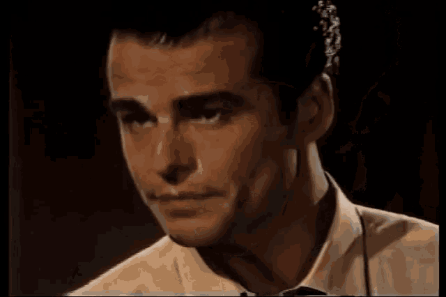 a close up of a man 's face with the words anna devane is mine