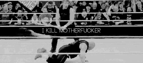 a black and white photo of a wrestling match with the words `` i kill motherfucker '' written above it .