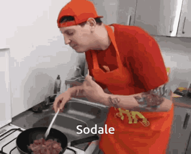 a man in an orange apron is stirring something in a frying pan and the word sodale is on the bottom of the image