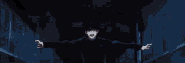 a close up of a person 's face in a dark room with a blurred background .