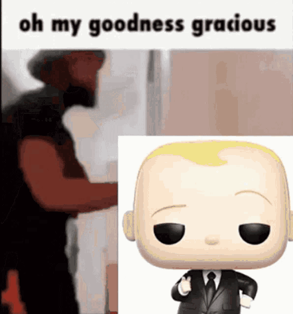 a man is standing next to a funko pop of a baby in a suit .