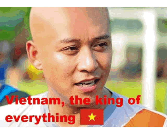 a bald man with the words vietnam , the king of everything on his shirt