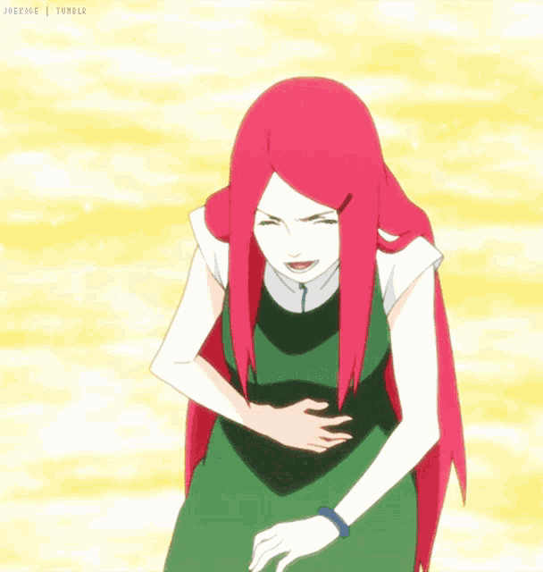 a girl with red hair and a green dress is holding her stomach
