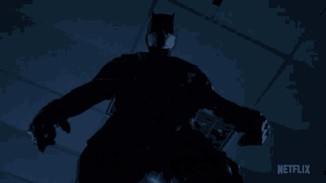 a man is flying through the air with a netflix logo in the corner