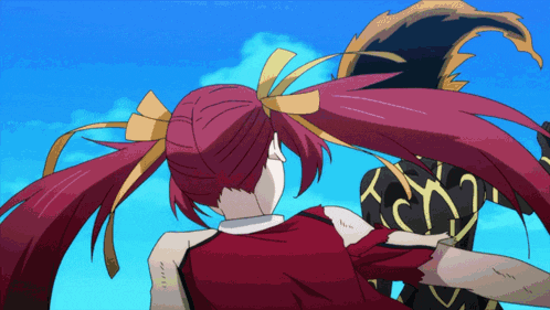 a girl with red hair is standing next to a man with black hair