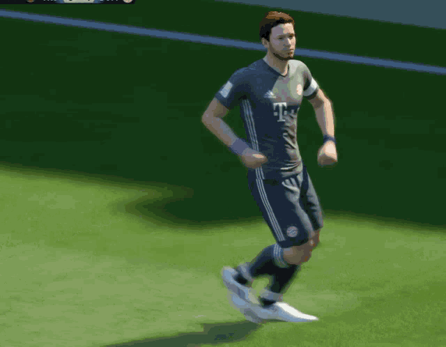 a blurry picture of a soccer player laying on the field