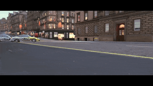 a yellow and white car with the word police on it