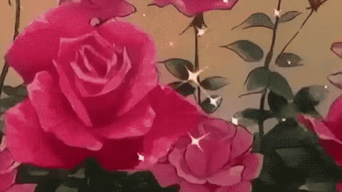 a bunch of pink roses are growing in a garden with sparkles coming out of them .