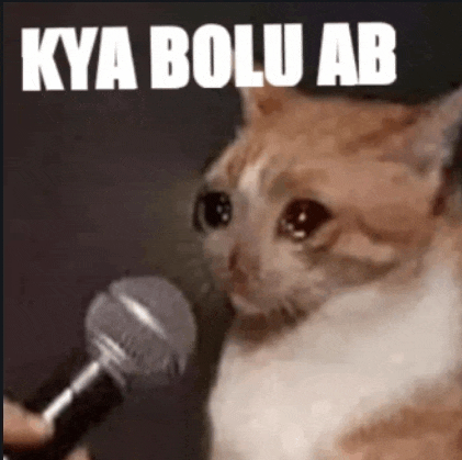 a cat is crying while holding a microphone with the words kya bolu ab written on the bottom .