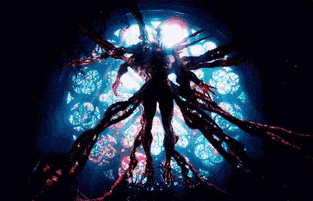 a stained glass window with a glowing light behind a monster