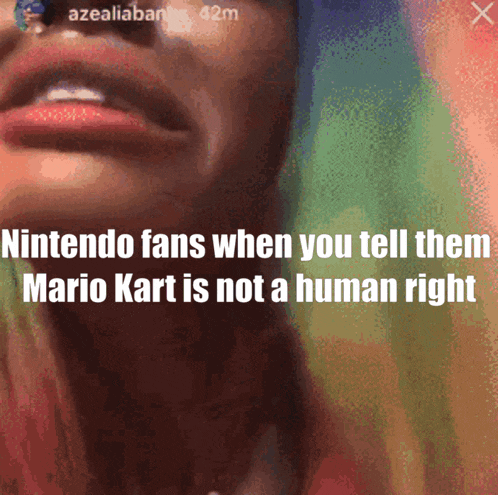a close up of a woman 's face with the words nintendo fans when you tell them mario kart is not a human