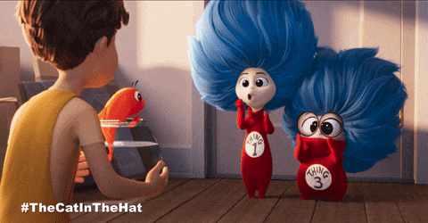 a poster for the cat in the hat shows a boy talking to two blue haired characters
