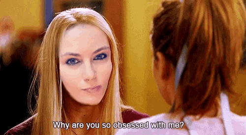 a woman is asking another woman why are you so obsessed with her
