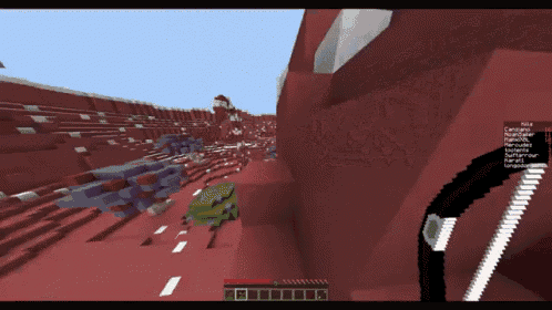 a screenshot of a minecraft game shows a green frog and a blue dragon
