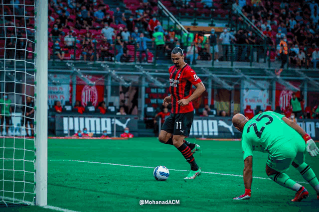 a soccer player with the number 11 on his shirt