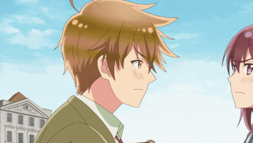 a boy and a girl are standing next to each other