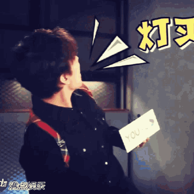 a person holding a card that says you